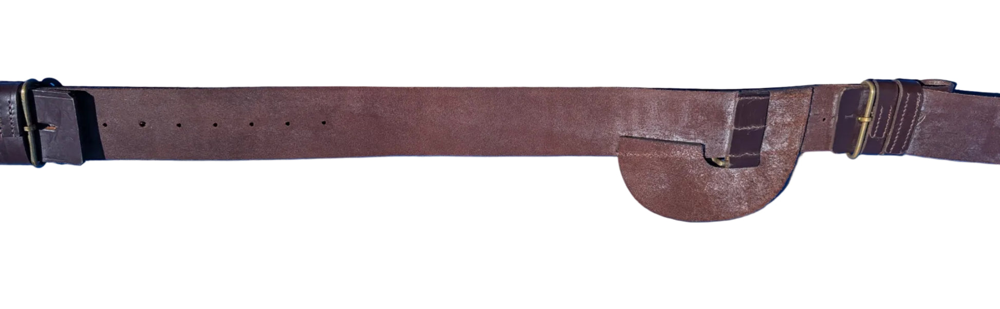 A brown leather strap, likely a vintage belt or strap component, laid horizontally across a bright blue surface with concrete visible at the top.British Army Infantry Brown Leather Sword Belt. Underside