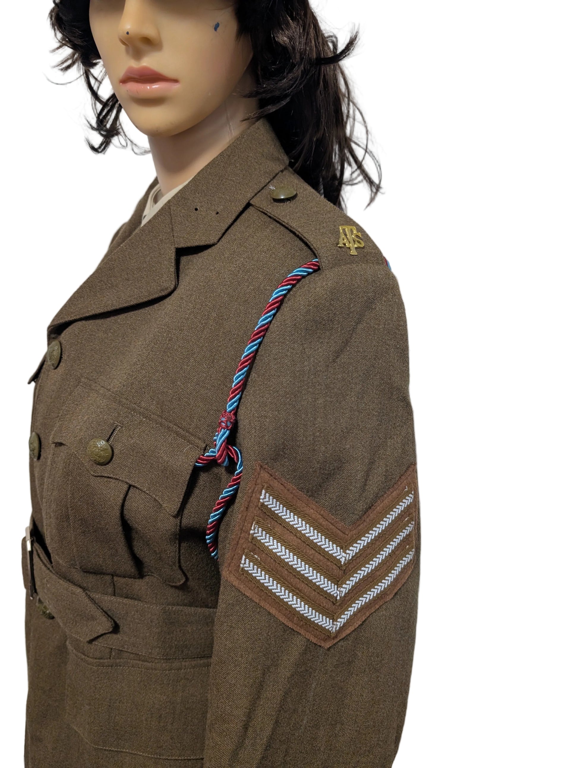 Woman dressed in WW2 ATS army jacket skirt and hat uniform 