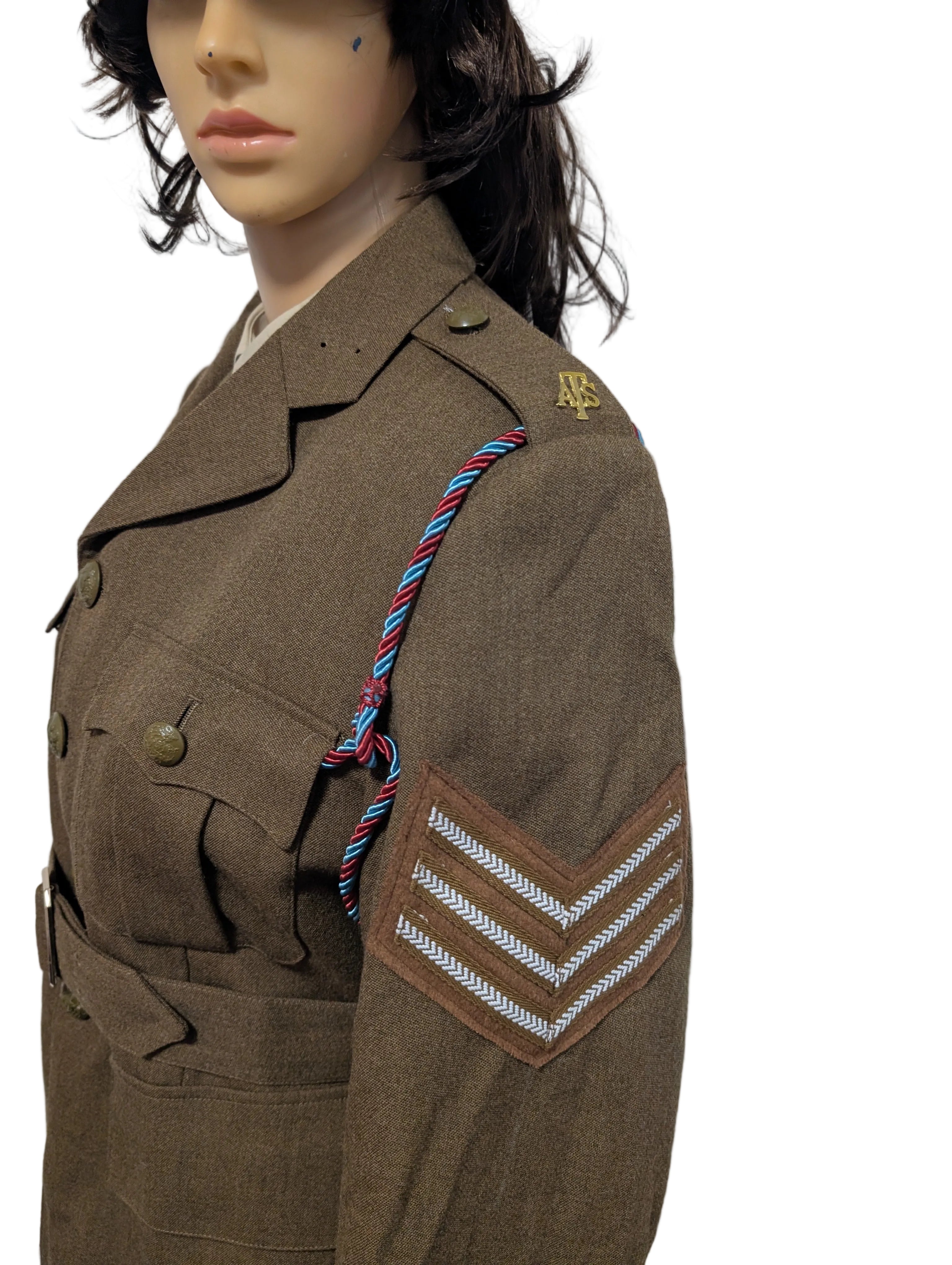 Woman dressed in WW2 ATS army jacket skirt and hat uniform 