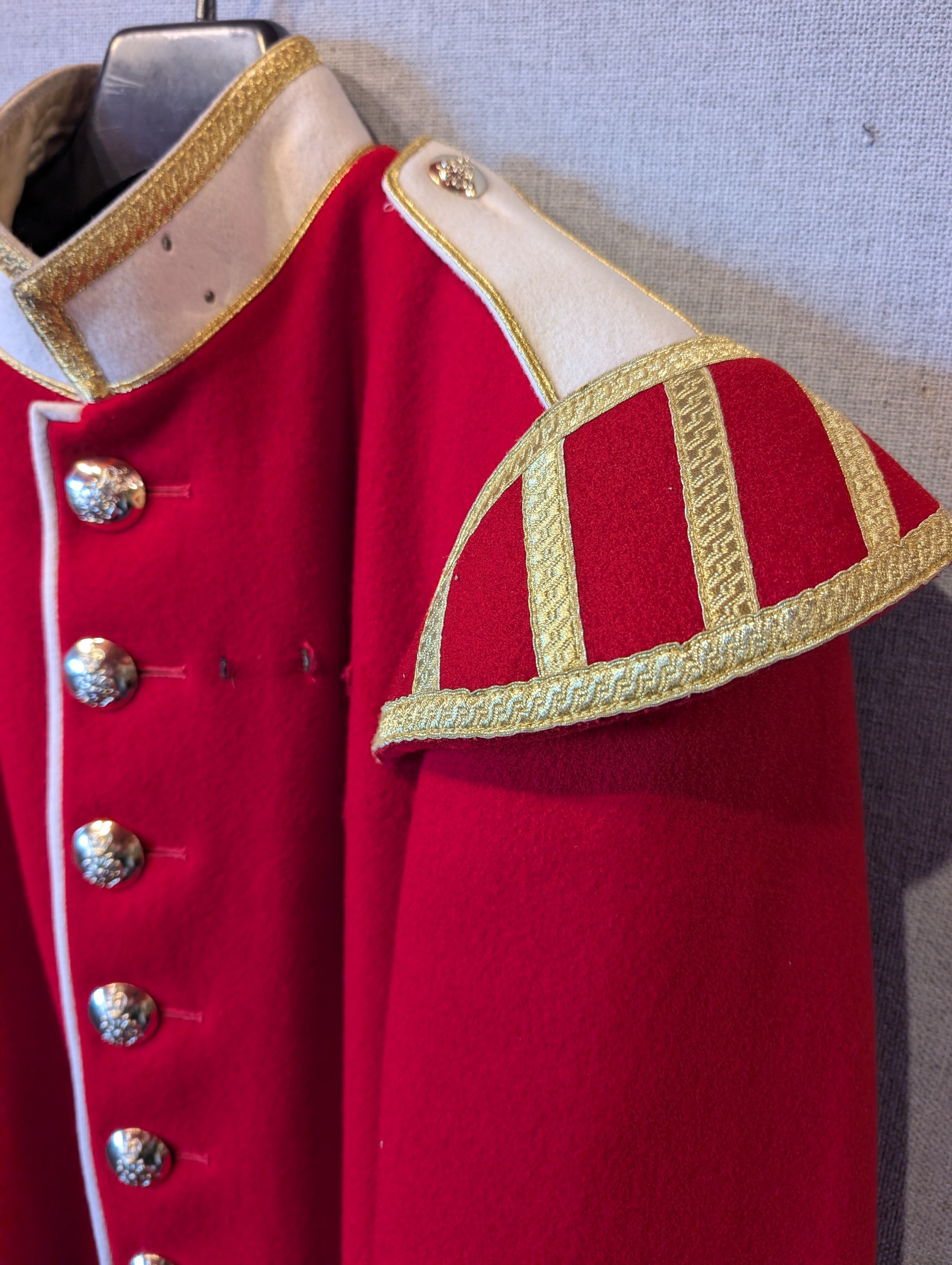 A King's Division bandsman's ceremonial tunic. Scarlet Melton wool with white facings and white piping, WO2 rank, bandsman's insignia. our ref G83