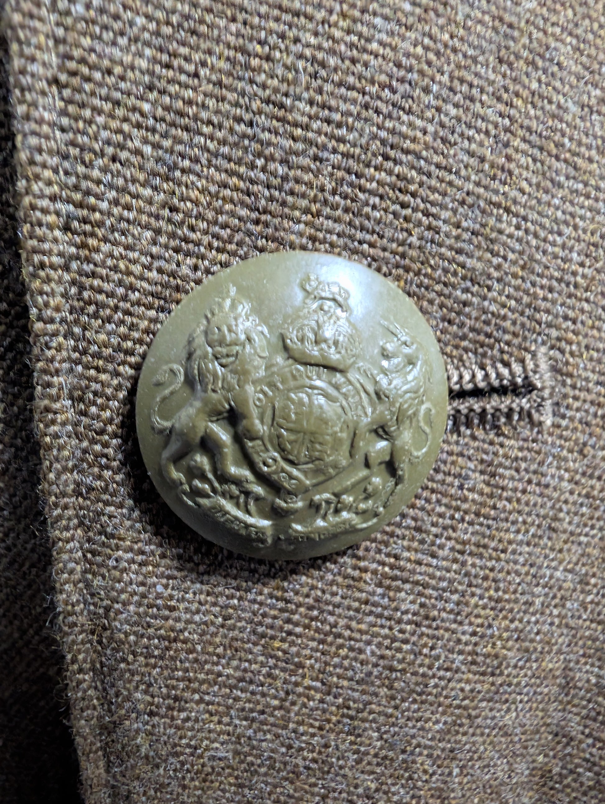 Economy ww2 bakelite button on ats uniform